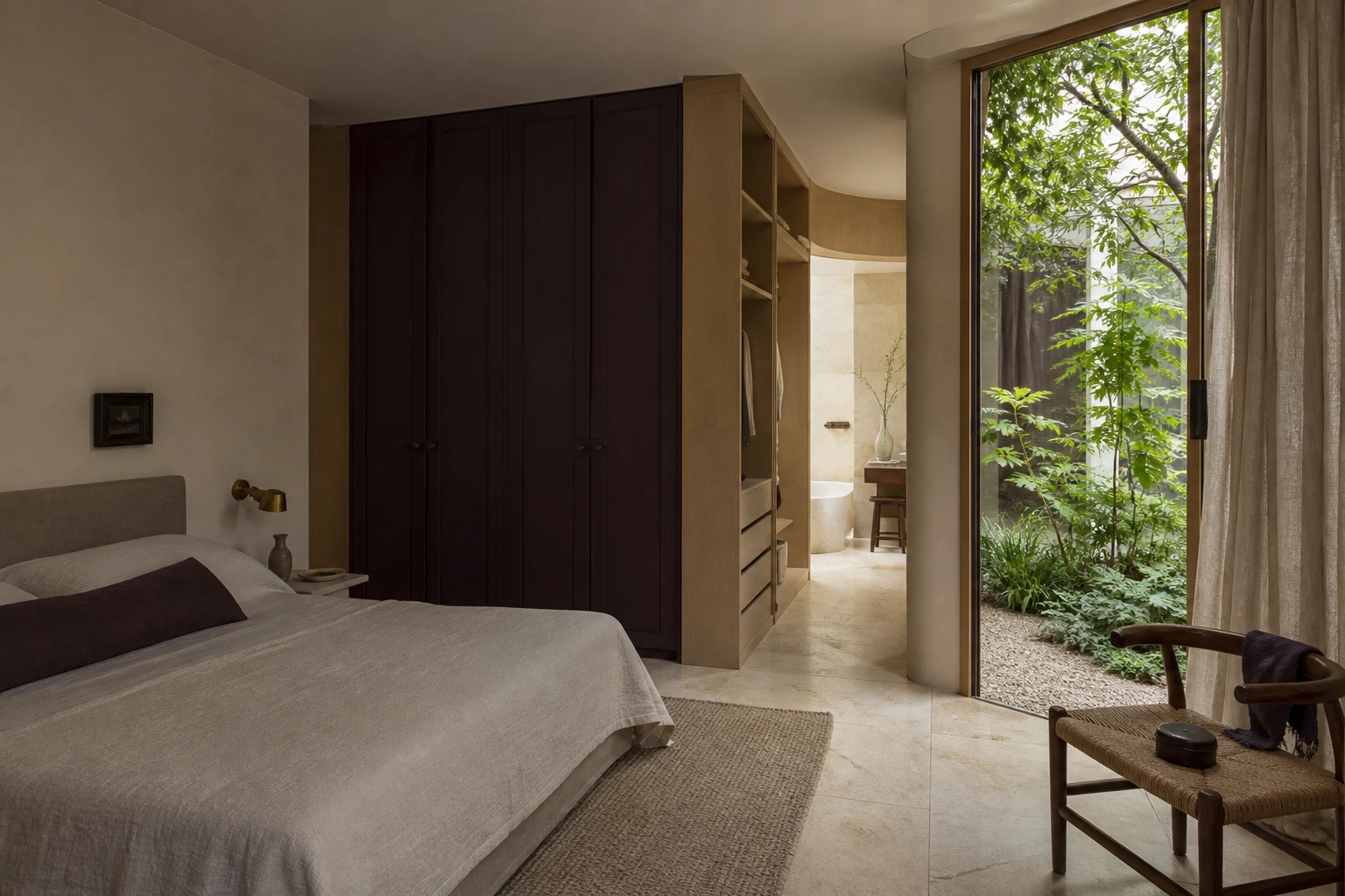 Principal bedroom, fitted dressing area, bathroom and courtyard coordinated as one interior